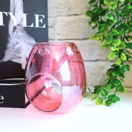 Add a touch of Sophistication and Style to your home with our stunning Pink Glass Wax Melt Burner. With its high-gloss finish and soft pink hue, this burner is the perfect blend of sophistication and modern elegance. Whether you’re looking to enhance your space with a decorative accent or indulge in your favourite home fragrances, this piece is a must-have.

Designed for both beauty and function, its open-cut design ensures optimal fragrance release, allowing your home to be filled with long-lasting.